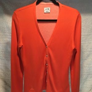 Adidas orange cardigan.